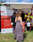 Mehrere Personen am Stand des BTZ Berlin auf dem Markt für seelische Gesundheit.